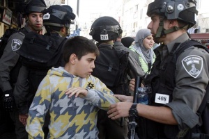 israeli-soldiers-arresting-a-palestinian-boy-child-in-salahaddin-street-for-throwing-stone-at-police-station